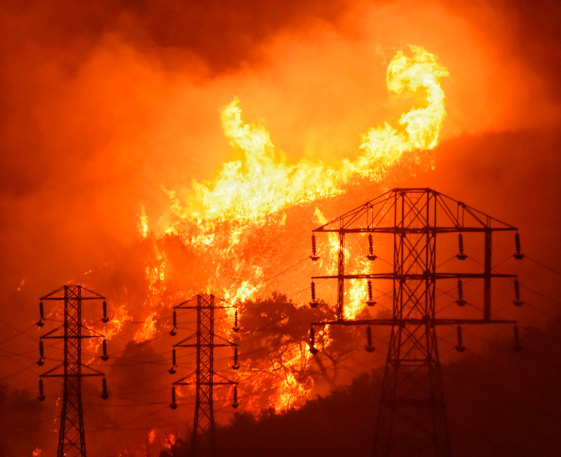 Flames during a December 2017 fire near power lines in Montecito, California.